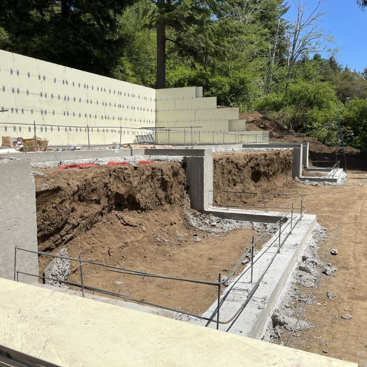 A large poured concrete foundation and footings